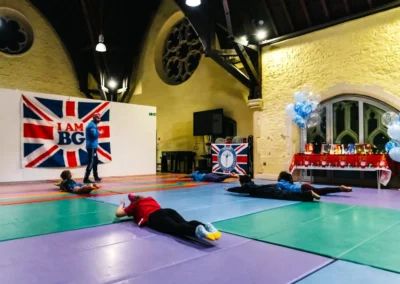Children enjoying fun games at the KCGA Christmas Gymnastics Event in Kensington, London W8.