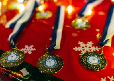 KCGA medals on a festive table at the Christmas Gymnastics Event 2022 in Kensington.