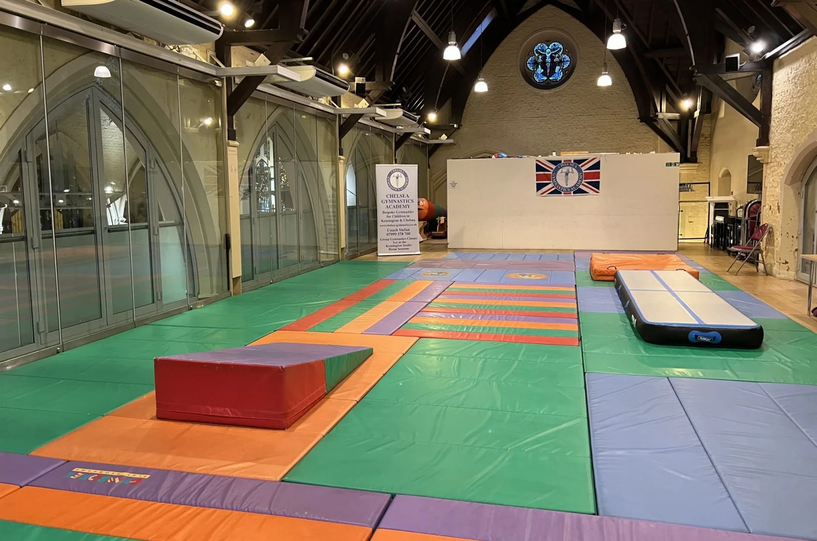 Kensington & Chelsea Gymnastics Academy setup with gymnastics mats at St Philip’s Church in Kensington London W8.