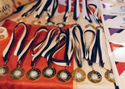 Medals laid out for KCGA Easter gymnastics awards ceremony in Kensington London W8.