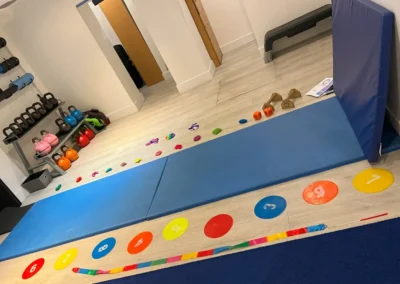 Kettlebells, mats, and children’s training equipment inside The Kensington Studio in Kensington London