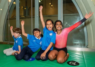 Children celebrating at gymnastics annual performance in Kensington London