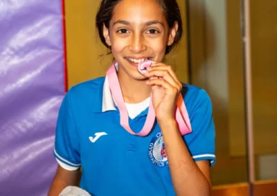 Children and coaches celebrating Easter 2025 at Kensington & Chelsea Gymnastics Academy