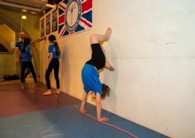 Children taking part in Easter 2025 gymnastics classes at Kensington & Chelsea Gymnastics Academy in London