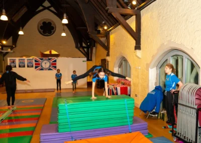 Children participating in Easter gymnastics classes at Kensington & Chelsea Gymnastics Academy in London