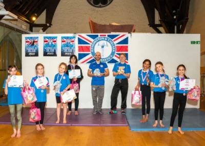 Children taking part in Easter gymnastics classes at Kensington & Chelsea Gymnastics Academy in London W8