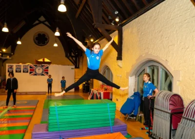 Children training in a gymnastics class during the Easter 2025 sessions in Kensington W8, London.