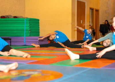 Children training together during KCGA Easter 2025 gymnastics session in Kensington London
