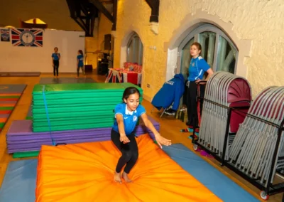 Children practising gymnastics vault skills during Easter 2025 at KCGA Kensington