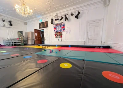 Spacious gymnastics hall inside More House School in Knightsbridge, featuring safe matting and a calm environment for children’s gymnastics classes.
