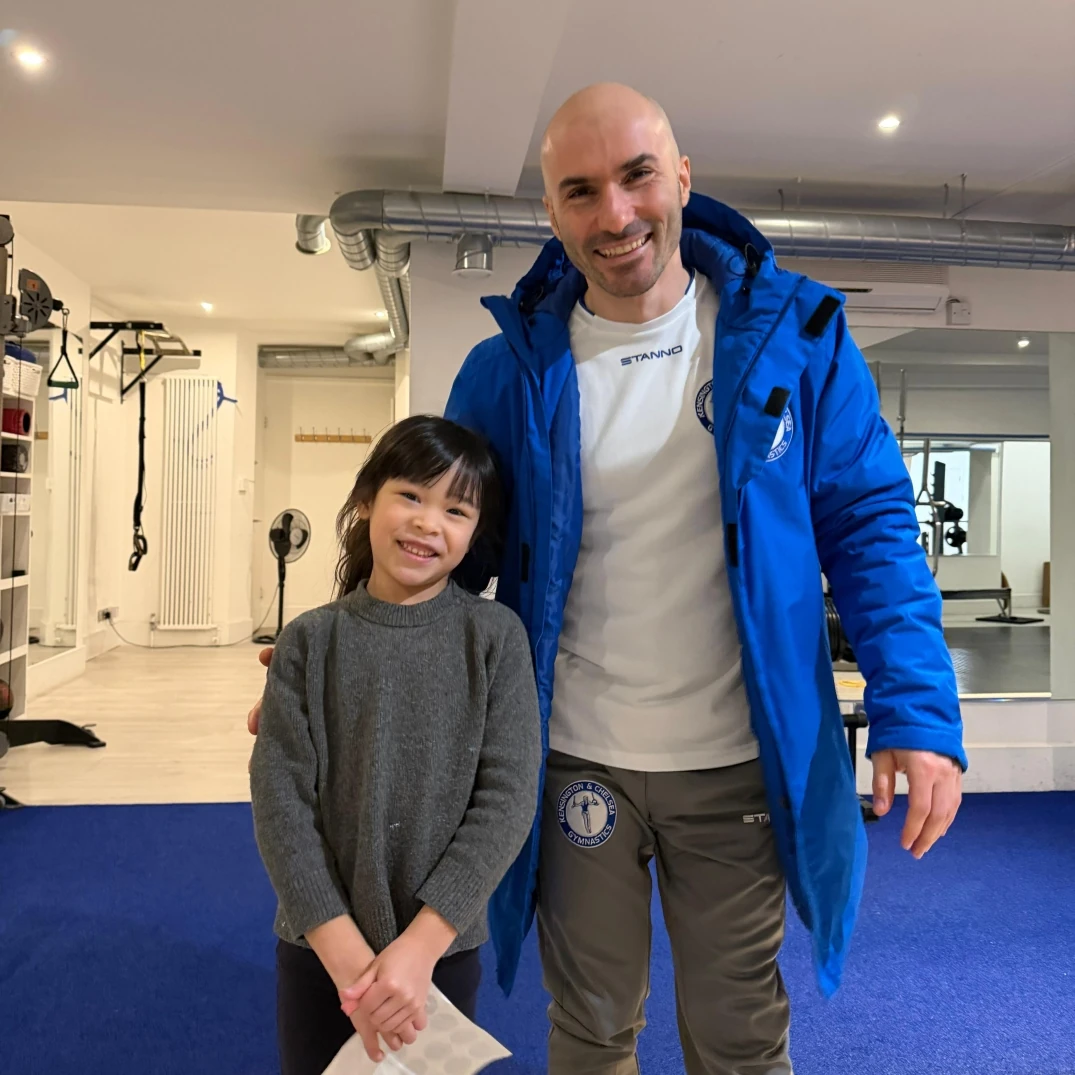 Coach Stefan and elite artistic gymnast during a private gymnastics lesson at the Kensington Studio in London