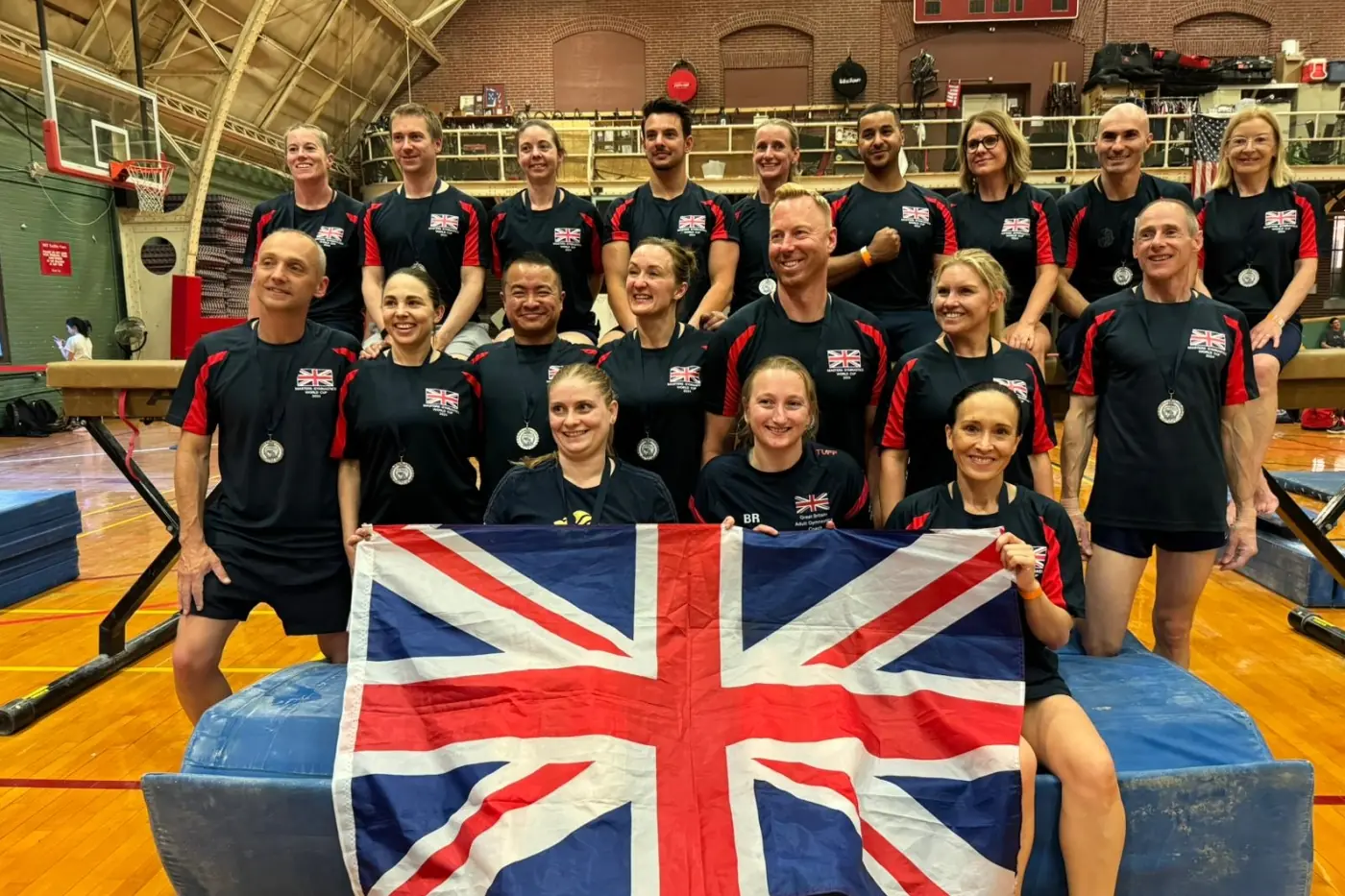 Dr Stefan Kolimechkov with the Great Britain Masters Gymnastics team at the 2024 Masters Gymnastics World Cup