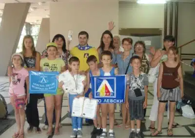 Coach Stefan Kolimechkov with gymnasts and parents after the Bulgarian National Championships, 2012