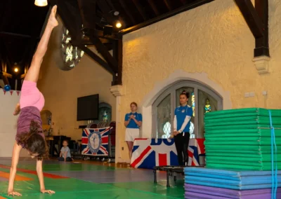 Young gymnast performing handstand at St Philip’s Church Kensington