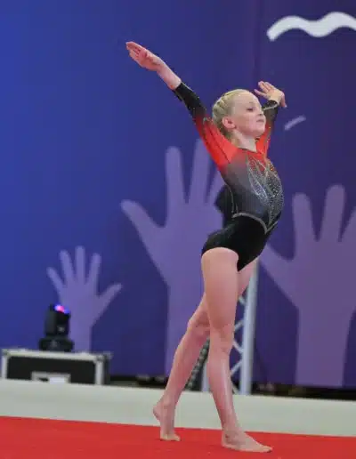 KCGA gymnast finishing her floor routine at the 2025 Essex Invitational.