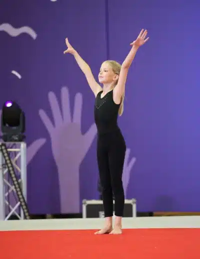 KCGA gymnast presenting on floor at the 2025 Essex Invitational.