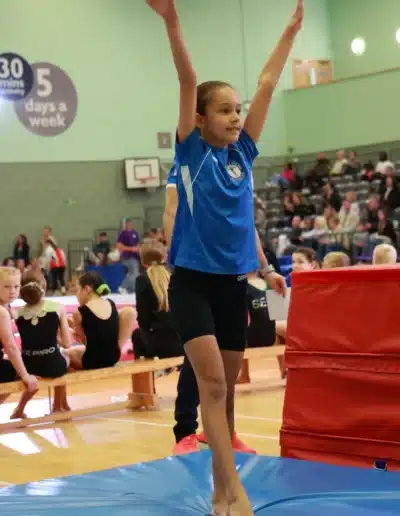 Sofia completing her vault landing at the 2025 Essex Invitational.