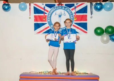 Children receiving gymnastics awards in Kensington W8 London at KCGA