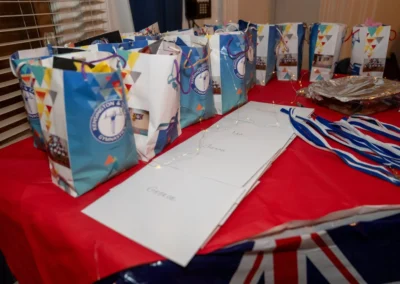 Awards table with certificates and gift bags for children’s gymnastics in Knightsbridge SW1X at More House School.