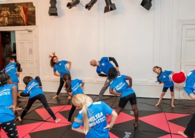 Children warming up in gymnastics class at More House School Knightsbridge SW1X