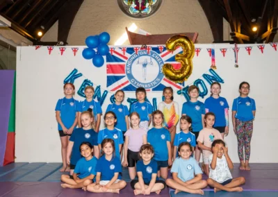 Children from Kensington gymnastics classes group photo at KCGA Annual Performance 2025 in London