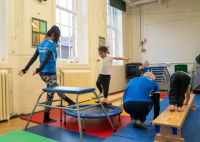 Young child practising the run and jump approach for gymnastics vault during a KCGA Chelsea class