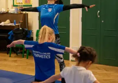 Children following a coach during a gymnastics warm up class in Chelsea, London SW3 during Easter 2026