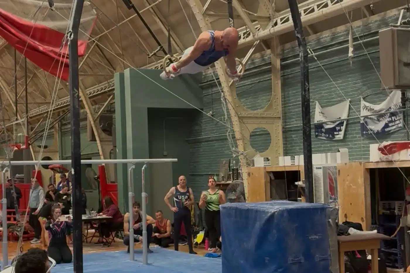 Dr Stefan Kolimechkov performing on still rings at the 2026 Masters Gymnastics World Cup in Cambridge, Massachusetts, USA