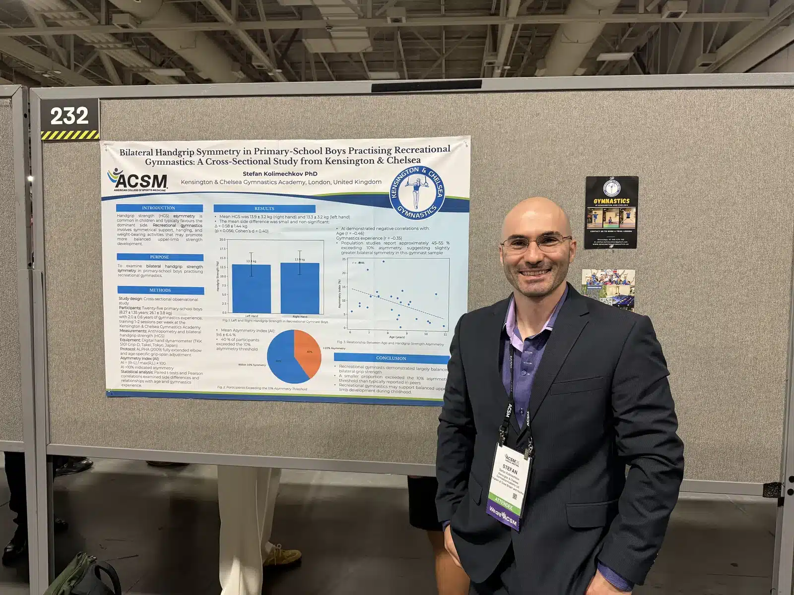 Dr Stefan Kolimechkov beside the KCGA handgrip symmetry research poster at ACSM 2026